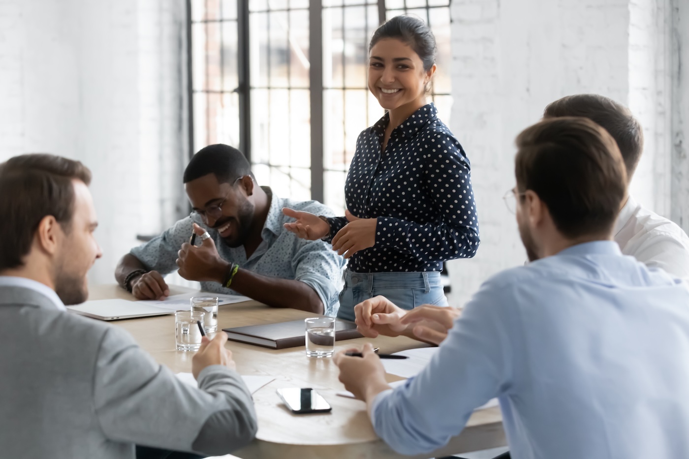 Diverse millennial business team with Indian leader discussing project, brainstorming in office, talking, laughing. Corporate teacher training staff, mentoring employees, holding meeting or training SSUCv3H4sIAAAAAAAACpxTyW7cMAy9F+g/DHQOAe1LfqXoQQs9I8RjB7acIgjy75XX8fTYi2E+ko/ko/j188flQoIfcySvl6/ZqnZu22ksgy+57ypMXzZ8wC7hcEY+BqHpGcCUSz9k357B4Eu8df6OFeymtp3h78VJxuLLNOI4V9+g6AteK8cKHhRri79W+7I7FmfNqC5CXk7YOIUF26GV/L8y15/f+zT+il38fPRWoTSgv48lLxMeLVaHUU/UjPMn27ijyk4/F2j9/fMfoqc0HbhTIhng1nKQVDkIVDhI3LhkBWMipAfx+rNMsSk8YIt+FX2rQRqpDEWKQJnGSskoeKYZoHbMSMdcCEfrRHsbpGUISdAIMgoD3ggOjTNSzQTBxyNYGWGdkxGSRQrSpMqckgOLVsiA1gbBjmAeUqANcyCrq35SAh9UBC2RKY5cJY0PZsaj1cYC5zrUnm2sMkgDKKKQruHOi0N+ErRWTEUJMTgDklkEq6kDHqRIVlnbcL9oti6CvP0pONzP79JPKfenJ/nRR9/OAeIk7fuQY+6up7S+3Jab2dNiP3VlmPd7LJW0ff/uQzu/nqZy4o7f/DjW8LTjp0KxXmh/P9Xp+rJsdGMlqZ7RbDLBtaDGOCG5cs5qsQWsp3fLlWdpZyeqdnzL6Tx6njsg2tVdJE1BNGrepLUQeGOr3o1IrqFJUVkl/P4LAAD//wMAiB0rvVUEAAA=